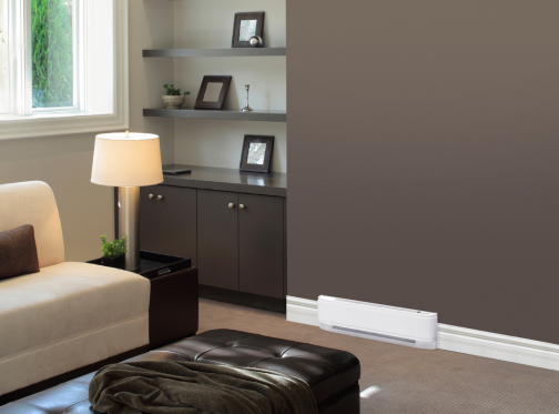 Small which baseboard heater located on an interior wall in a large home office