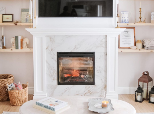 Revullison electric fireplace with marble stone surround