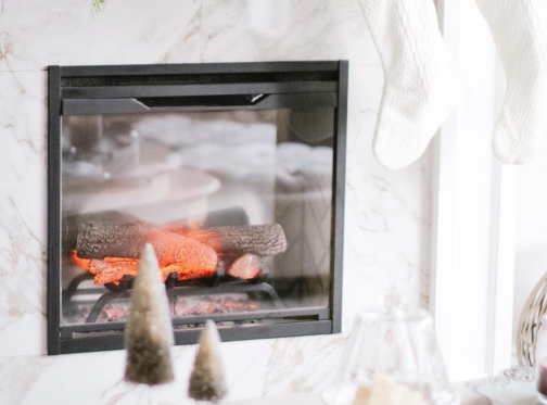 Revullison electric fireplace with marble stone surround