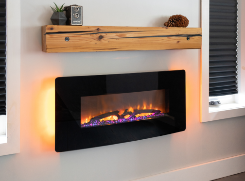 Wall mount Dimplex electric fireplace with color changing back lights.