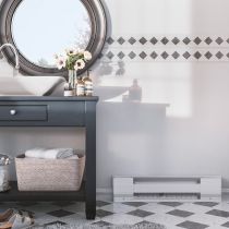 A baseboard heater mounted to the skirting board of a bathroom floor next to a sink